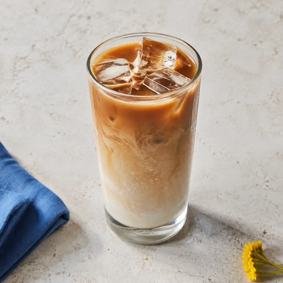 Iced latte with espresso and milk layers